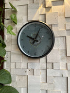 Nature's Groove reverse clock close up showing earthy botanical dial design