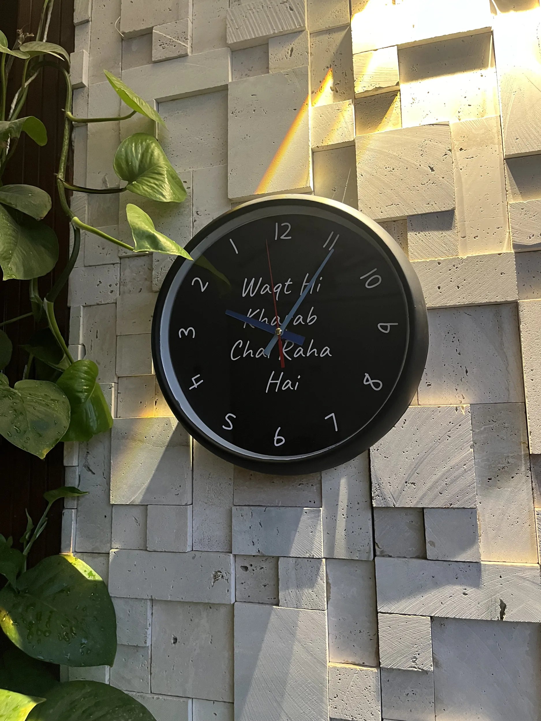 Waqt Hi Kharab reverse clock close up showing reversed numerals Pakistan